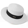 Detail of a beige straw hat with black ribbon and a gold Hi Crown metal plaque - M (56-58cm) / White (With Black Ribbon)
