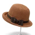 Elegant brown woven straw cloche sun hat with a decorative ribbon bow for elderly women - M / Orange
