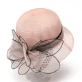 Detail of elegant pink organza hat featuring layered mesh bow and black lace trim - M / Pink