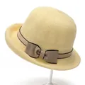 Detailed close-up of straw sun hat with elegant brown bow and fine woven texture - M (56-58cm) / Beige