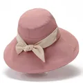 Pink wide brim sun hat with elegant beige ribbon bow for outdoor summer UV protection - M / Pink
