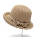 Elegant beige straw sun hat for elderly women with brown ribbon and bow decoration - M / Khaki