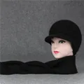 Close-up of black cable-knit wool hat with brim and matching warm ribbed scarf set - One Size (Stretchy) / Black (Hat And Scarf)