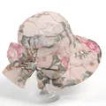 Women's pink floral wide brim sun hat with bow decoration and gold grid embroidery detail - Pink