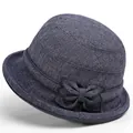 Elegant dark blue cloche hat for elderly women with textured weave and bow detail - M / Blue