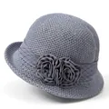 Detail of grey-blue woven sun hat with fabric roses, satin ribbon and polka dot mesh veil - M (56-58cm) / Gray