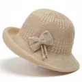 Elegante beige gebreide zonnehoed met opengewerkte textuur en strik voor strandvakanties - M / Beige