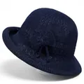 Dames gebreide vissershoed in marineblauw met modieuze strik voor de zonwering - M / Marineblauw