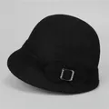 Close-up of elegant black wool cloche hat featuring a decorative rhinestone buckle detail - M (56-58cm) / Black