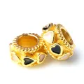 Abalorios cilíndricos dorados de corazón con esmalte blanco y negro para pulseras - Dorado