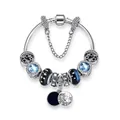 Blue starry night themed charm bracelet with silver snake chain and moon star pendants - XS