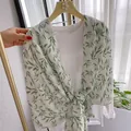 Elegant cotton linen long scarf with green leaf prints on a white long-sleeve top - Medium-Long Style / Fresh Green Leaves (A-1)