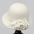 Close-up of elegant wool cloche hat with satin flowers and faux pearl detailing - Bucket Hat / M (56-58cm) / White