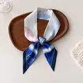 Close-up of abstract watercolor silk scarf tied on a wooden tray with soft lighting - Blue Pink Watercolor Splatter (U-21)