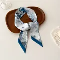 Floral print narrow silk scarf twilly with blue flowers on a dark wooden tray - Blue White Cool Floral (B-2)