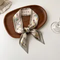 Narrow pink silk floral hair ribbon with Life script on a rustic wooden tray - Pink Floral Style (B-2)