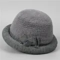 Detail of grey knitted cloche hat featuring plush texture and elegant bow accent - M (56-58cm) / Dark Gray