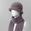 Detail of purple knitted winter hat and scarf set with intricate textures and bow - M / Hat And Scarf / Taro
