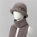 Detailed close-up of knit winter hat and scarf set with elegant bow and faux fur pom-pom - M / Hat And Scarf / Khaki
