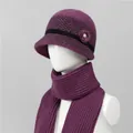 Detail of purple winter knit hat and scarf set with houndstooth pattern and fur ball - Hats And Scarves / Mauve