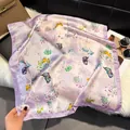 Lavender silk-satin square scarf featuring elegant butterfly and floral patterns - Light Purple