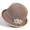 Detail of elegant brown straw cloche hat with floral ribbon and pearl embellishment - M (56-58cm) / Khaki