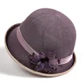 Detailed knit texture of a purple sun hat with elegant silk flower and bead decoration - M (56-58cm) / Taro