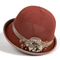 Close-up of brick red cloche hat with textured weaving and beaded flower detail - M / Orange