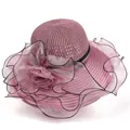 Detail of elegant pink sun hat with breathable woven top and delicate organza floral decor - M (56-58cm) / Mauve