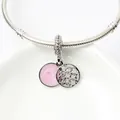 Silver snake chain bracelet featuring pink enamel star charm and hollow round pendant - Pink