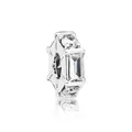 Close-up of a silver charm with rectangular emerald cut crystal and sunburst metal details - White