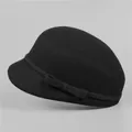 Detailed close-up of a black wool cloche hat featuring an elegant side ribbon and bow detail - M (56-58cm) / Bow Decoration Style (258251) / Black
