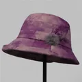 Detail of elegant purple tie-dye bucket hat with bow and soft fur ball decoration - M (56-58cm) / Purple