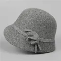 Detail of wool cloche hat with grey felt fabric and a 3D floral accent for women - M (56-58cm) / Gray