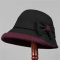 Elegante wollen dames klokhoed met strikaccent en tweekleurige vintage stijl - M / 56-58cm / Zwart