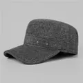 Detail of grey herringbone fabric and metallic brand plaque on this classic flat cap - Adjustable / Dark Gray