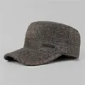 Detail of herringbone pattern fabric and metal logo on autumn winter flat top military hat - Adjustable / Coffee
