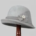 Detailed view of gray knit bucket hat featuring a floral accent with elegant pearl beads - M (56-58cm) / Gray