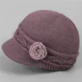 Winter knitted warm hat for elderly women in purple with faux fur flower decoration - One Size Stretchy / Taro