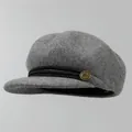 Detail of wool newsboy hat with braided black strap and vintage brass button accent - Adjustable / Light Heather Grey