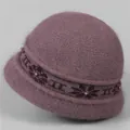 Detail of purple knitted winter hat featuring fluffy rabbit fur texture and pearl accents - One Size Stretchy / Taro