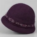 Detailed view of dark purple winter knit hat with floral jacquard and beaded accents - One Size Stretchy / Purple