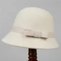 Detail of elegant cream wool felt cloche hat with a matching ribbon bow decoration - M (56-58cm) / White