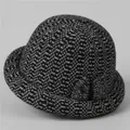 Detail of grey knitted cloche hat featuring thick warm fabric and side bow decoration - M (56-58cm) / Black