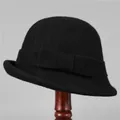 Detalle de sombrero cloche de lana negra con lazo elegante y cinta tejida de alta calidad - M(56-58cm) / Negro