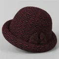 Detailed close-up of a women's warm knitted cloche hat with red black plaid and bow decoration - M (56-58cm) / Burgundy