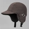 Close-up of quilted nylon fabric and warm faux fur lining on a winter trapper hat - M (56-58cm) / Brown