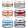 Détail de sets de 4 bracelets bohèmes en corde cirée avec perles et marguerites - Style C-Collection