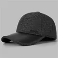 Detailed side view of men winter baseball cap with thick wool fabric and sports logo - Adjustable / Gray