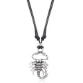 Detailed view of the antique silver scorpion pendant on a black woven cord necklace - Scorpion Shape